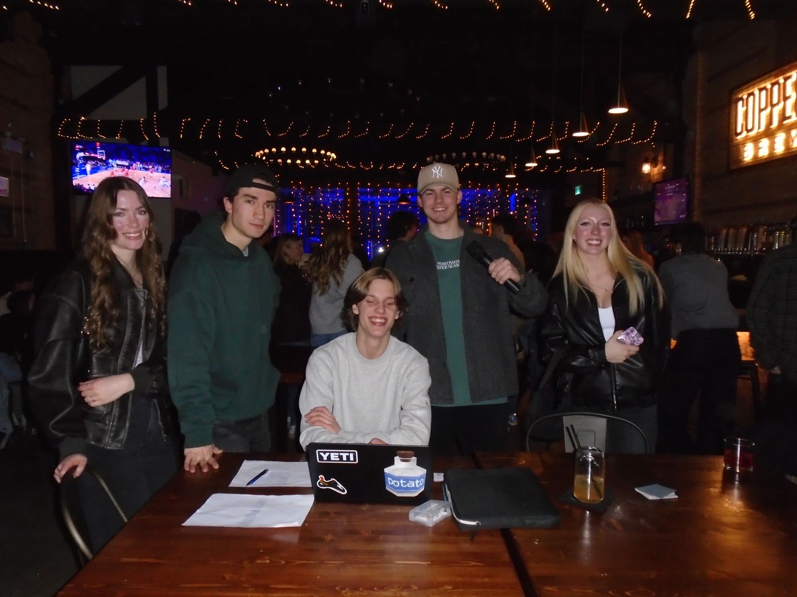 Members gathered around a table