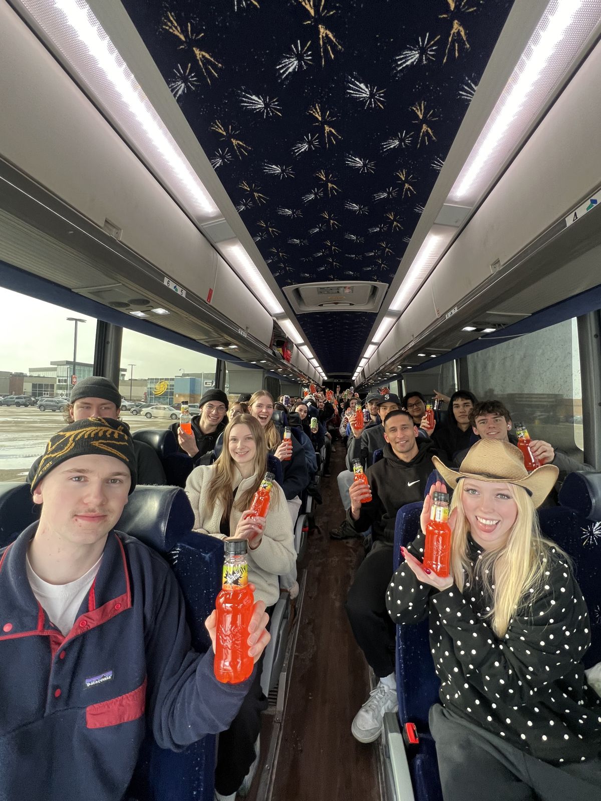 Members on the bus to a trip