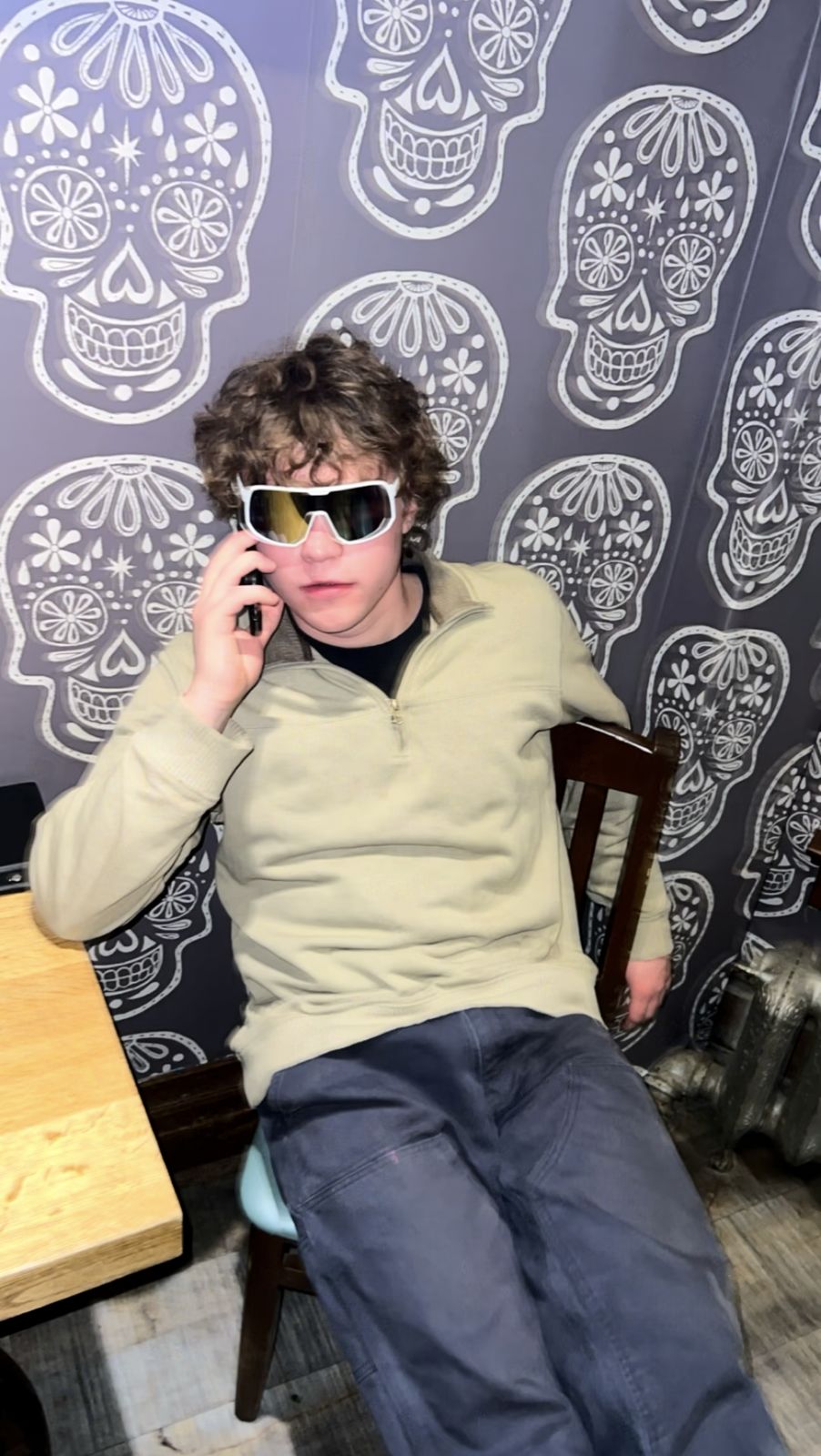 Member on the phone in sunglasses