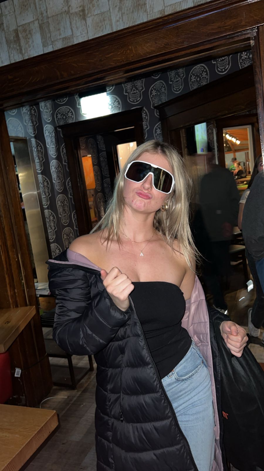 Member posing in ski goggles